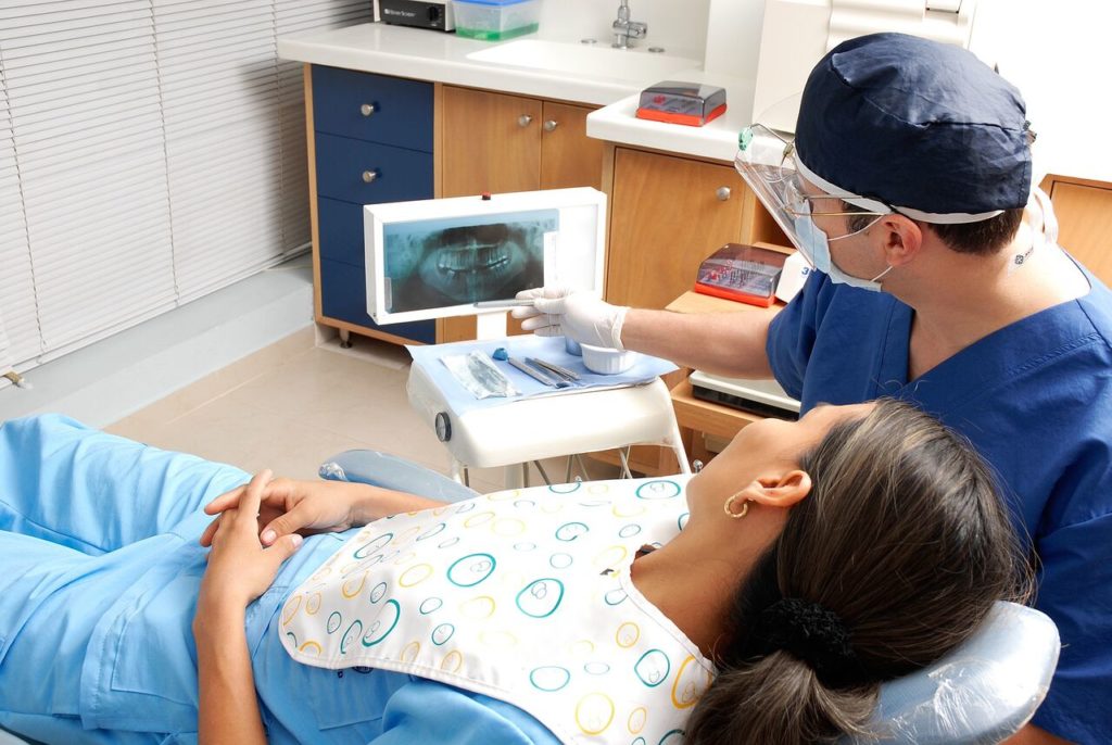 A dentist showing a digital xray to the patient - Mississauga Dentist - Bristol Dental