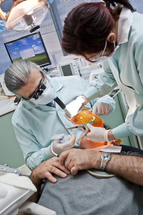 Dental professionals working on the patient's mouth - Mississauga Dentist - Bristol Dental